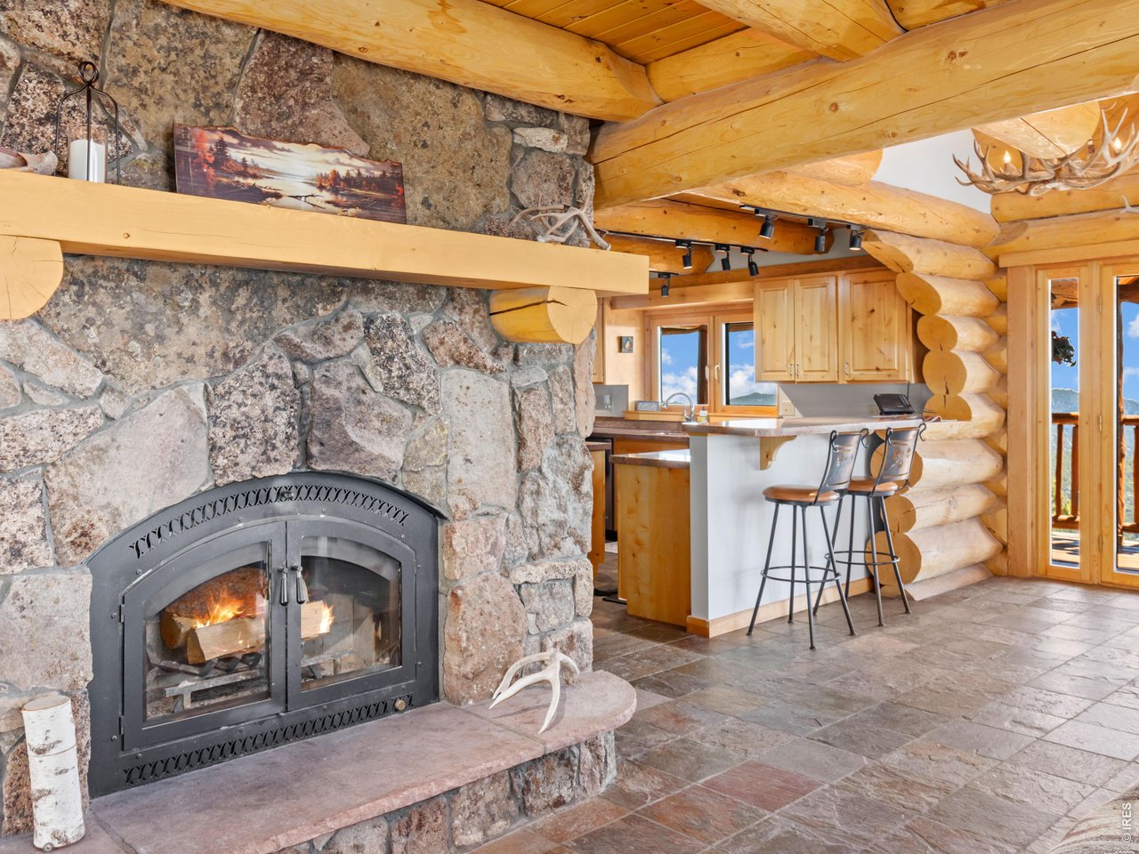 1398 Gold Lake Road Ward, CO 80481 - Photo 13 of 40 Main Level Fire Place
