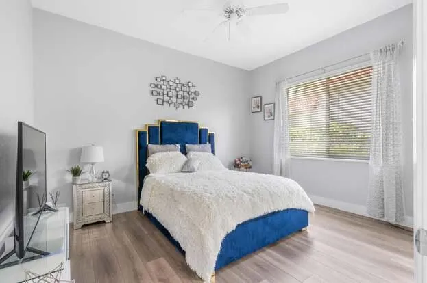 a bathroom with a sink a toilet and vanity