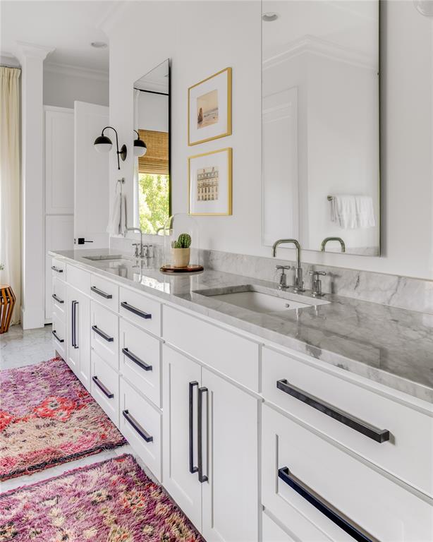 6905 Northridge Drive Dallas, TX 75214 - Photo 26 of 35 a bathroom with double sink and a mirror