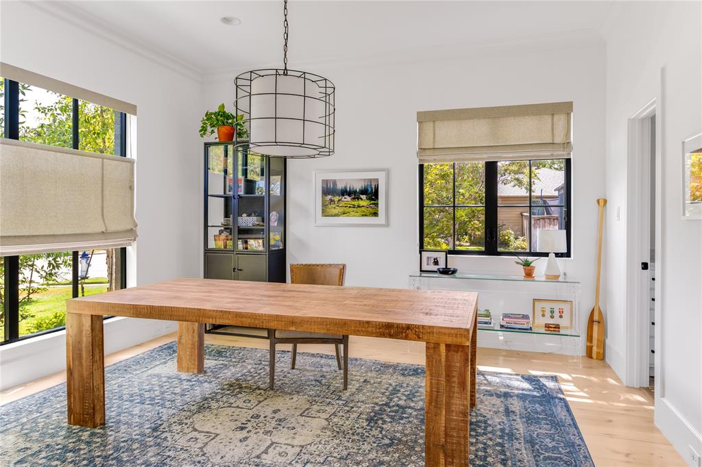 6905 Northridge Drive Dallas, TX 75214 - Photo 5 of 35 a living room with dining table and a window