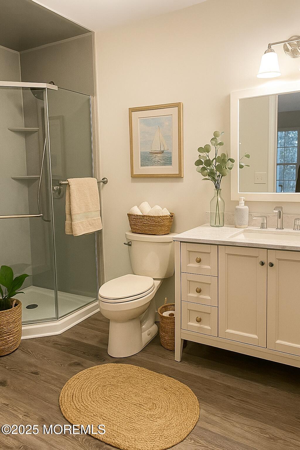 357 Volley Court Wall, NJ 07719 - Photo 13 of 19 a bathroom with a toilet sink and shower