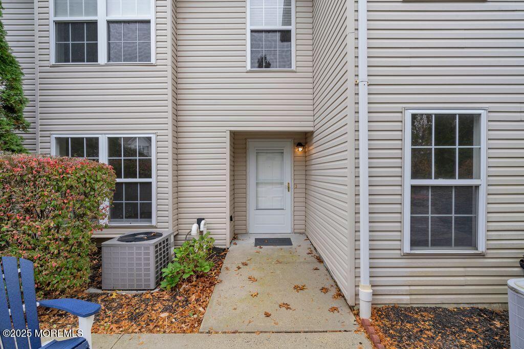 357 Volley Court Wall, NJ 07719 - Photo 3 of 19 a view of a house with windows