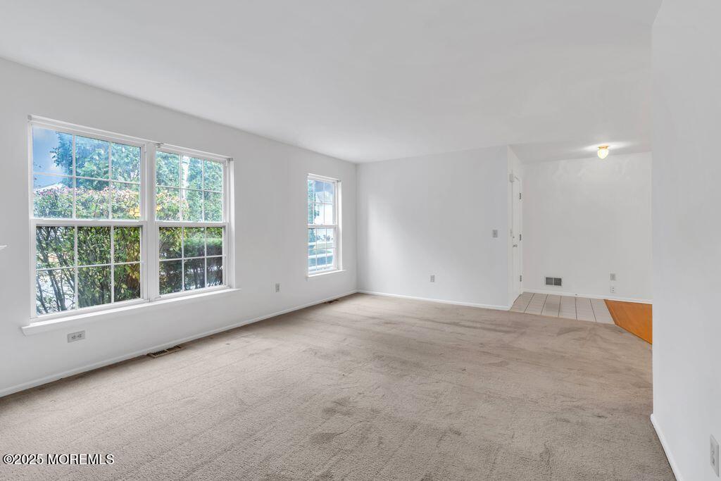 357 Volley Court Wall, NJ 07719 - Photo 4 of 19 a view of an empty room with a window