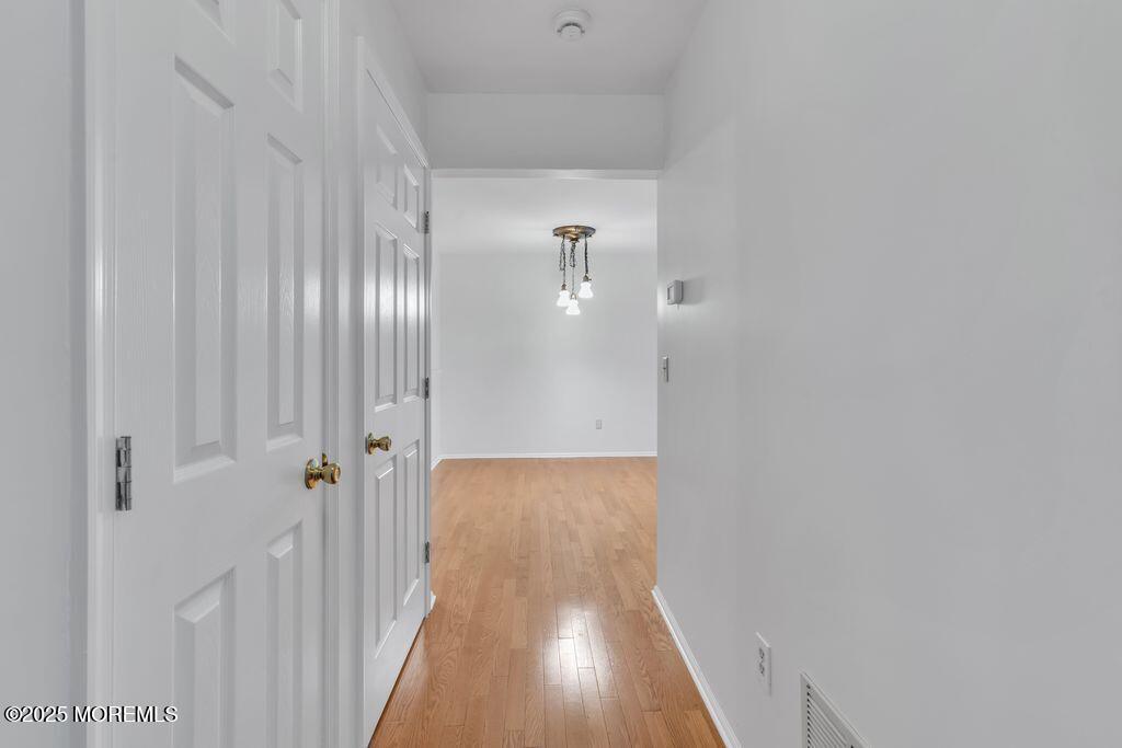 357 Volley Court Wall, NJ 07719 - Photo 9 of 19 a view of a hallway