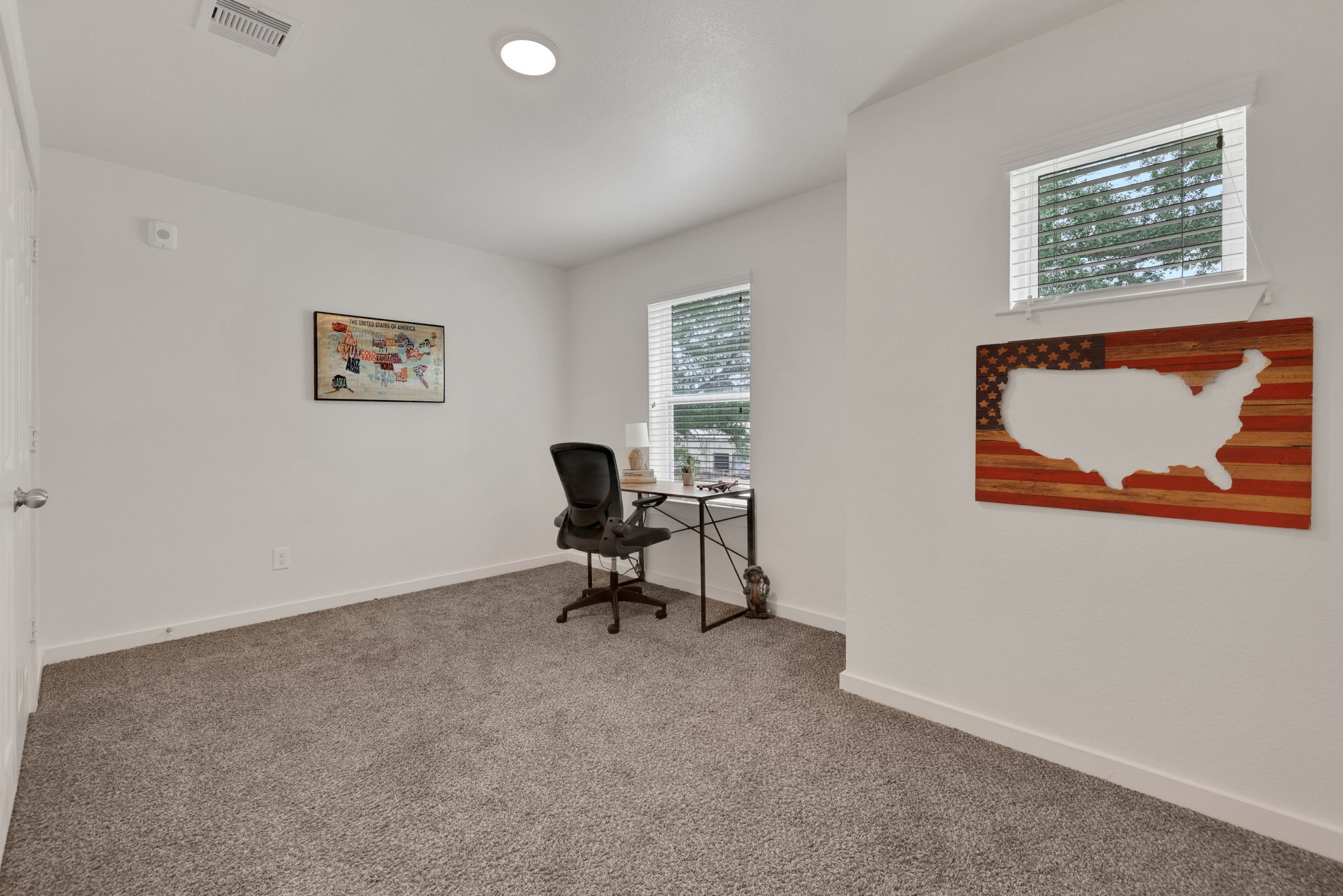 12603 Telge Road, Unit 30CD Cypress, TX 77429 - Photo 17 of 22 a view of a workspace with furniture and a window