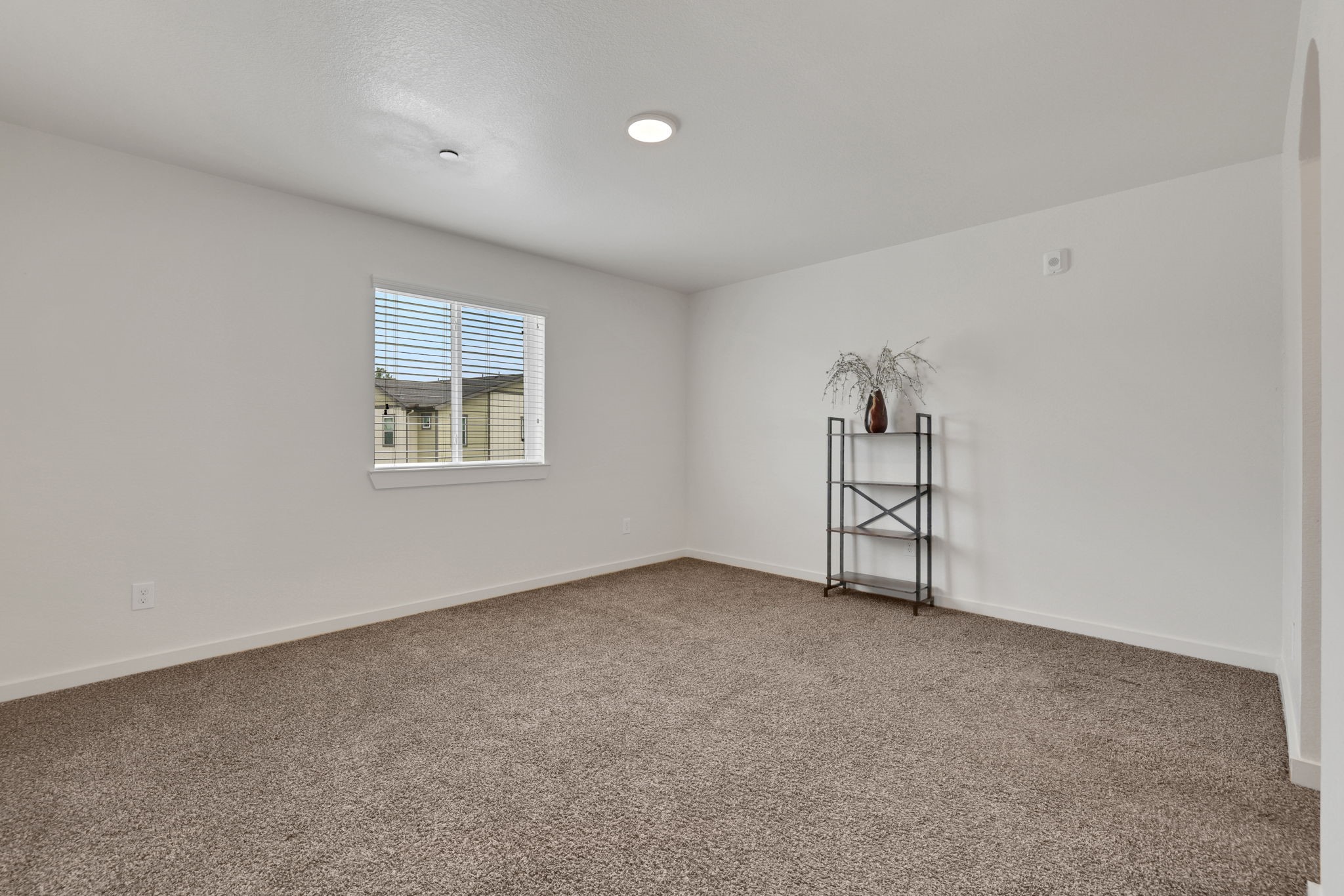 12603 Telge Road, Unit 30CD Cypress, TX 77429 - Photo 20 of 22 an empty room with windows