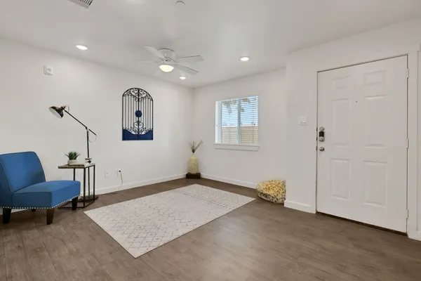 a view of livingroom with furniture and windows