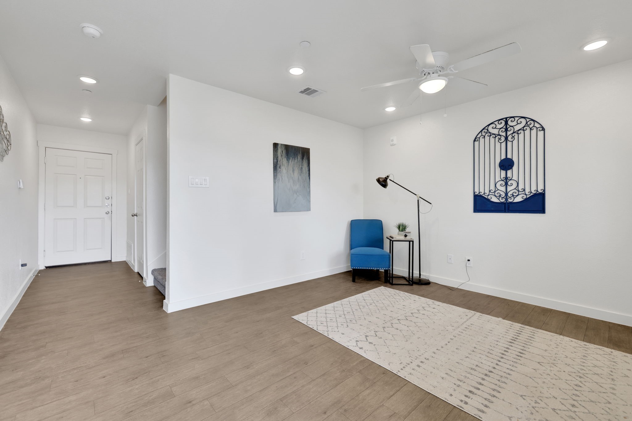 12603 Telge Road, Unit 30CD Cypress, TX 77429 - Photo 4 of 22 a view of a livingroom with wooden floor and window
