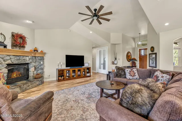 a kitchen with stainless steel appliances granite countertop a sink and cabinets