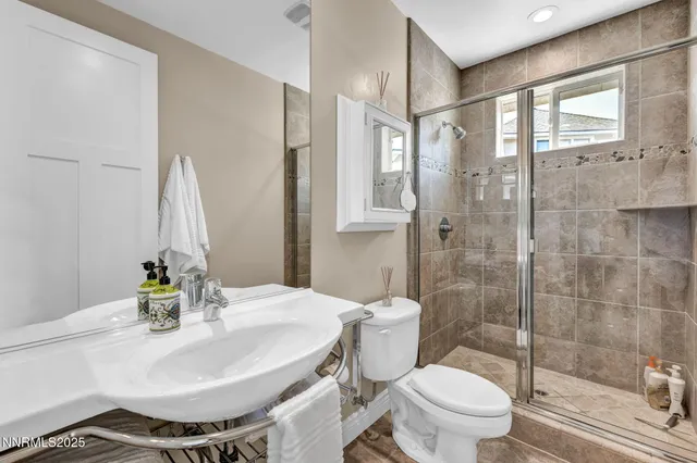 a kitchen with stainless steel appliances granite countertop a sink and a microwave