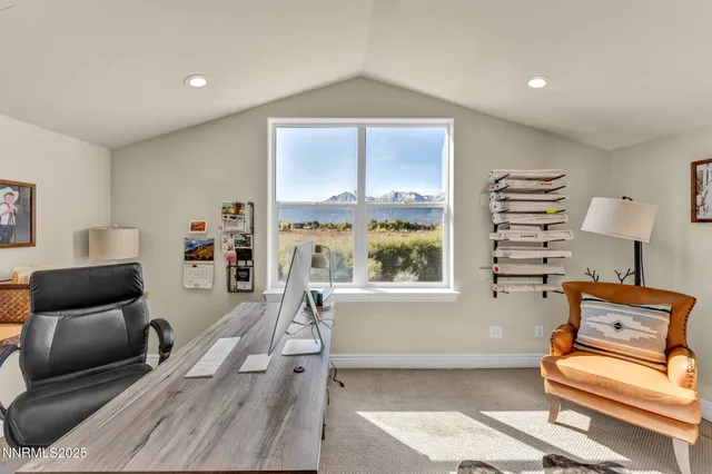 a living room with furniture kitchen view and a dining table