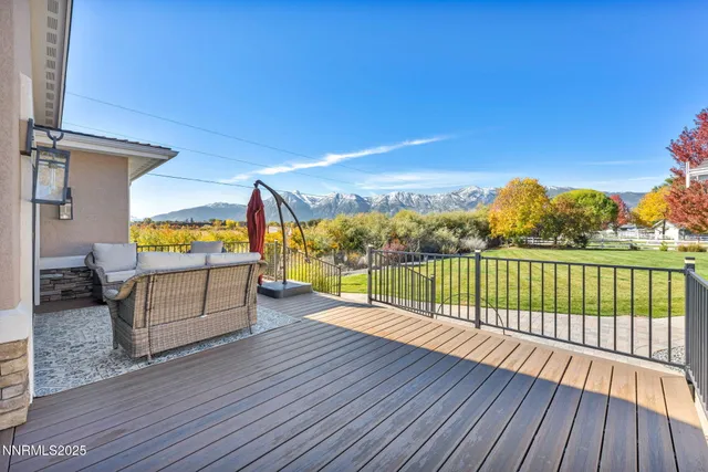 a kitchen with stainless steel appliances granite countertop a refrigerator a stove top oven a sink and dishwasher