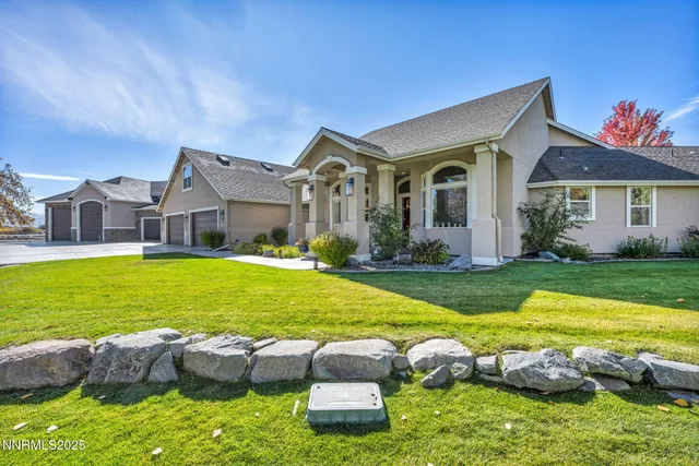 a dining room with furniture and a kitchen view