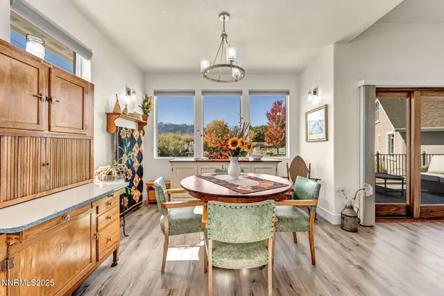 a work room with furniture and a ceiling fan