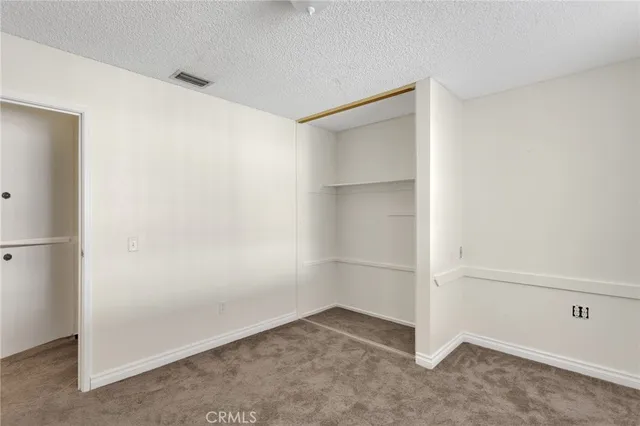 an empty room with closet