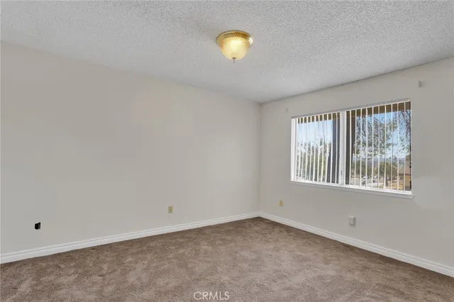 a view of a room that has a window