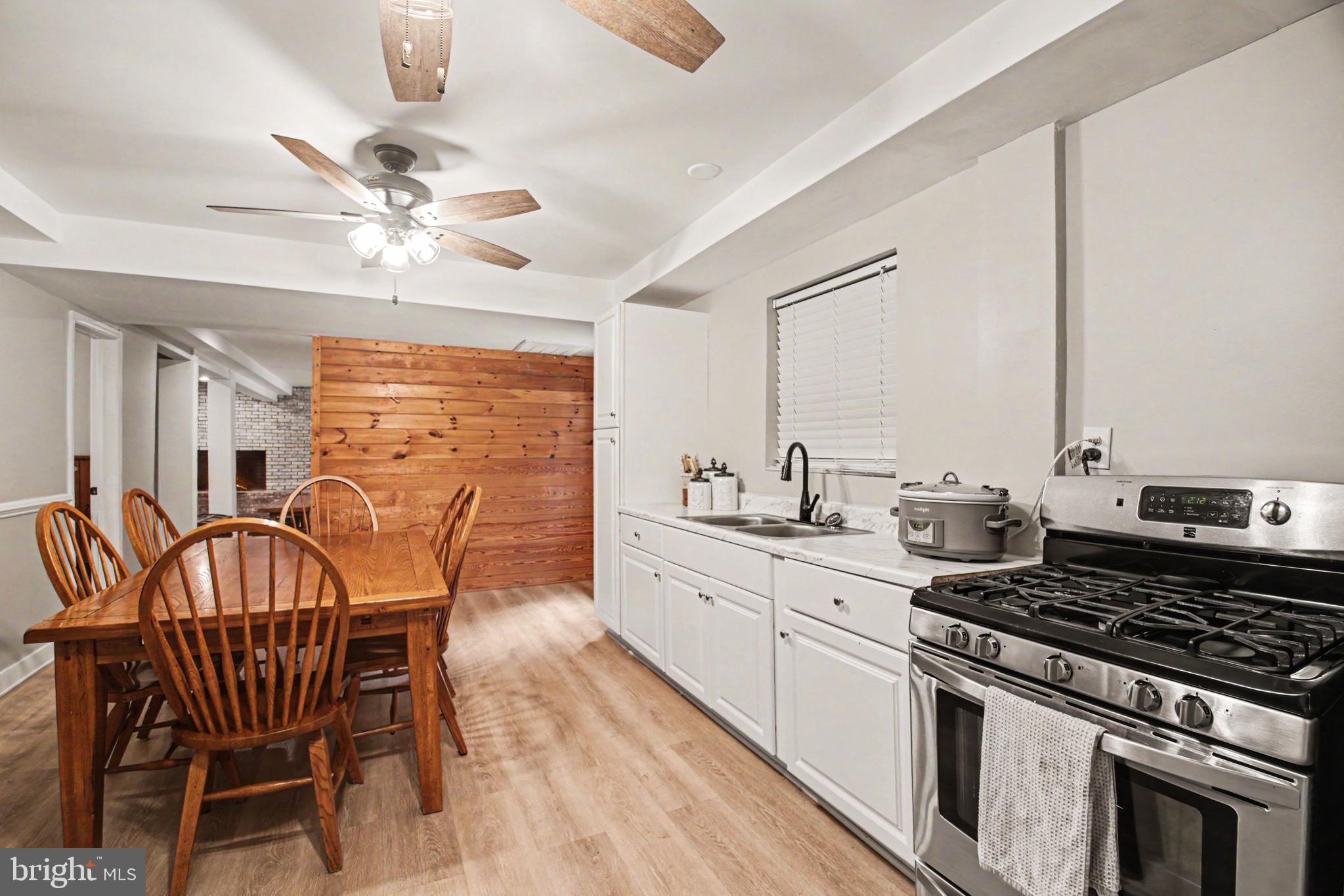 10224 Mill Pond Road Spotsylvania, VA 22551 - Photo 29 of 52 Lower Lvl Kitchen w/Laminate Counters & Gas Stove