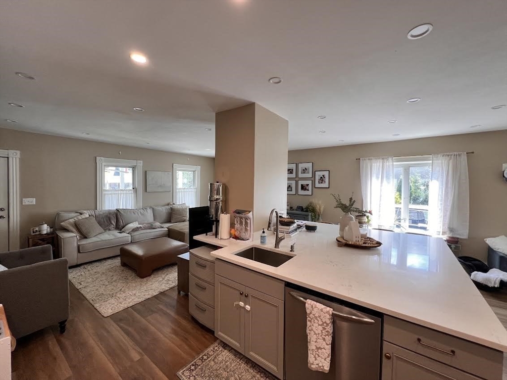 248 Greeley Street Clinton, MA 01510 - Photo 7 of 25 a living room with furniture and wooden floor