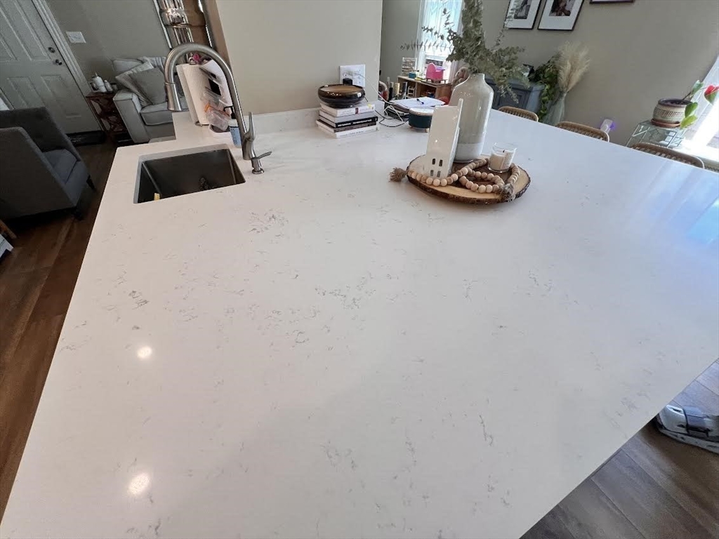 248 Greeley Street Clinton, MA 01510 - Photo 9 of 25 a room with gym equipment and wooden floor