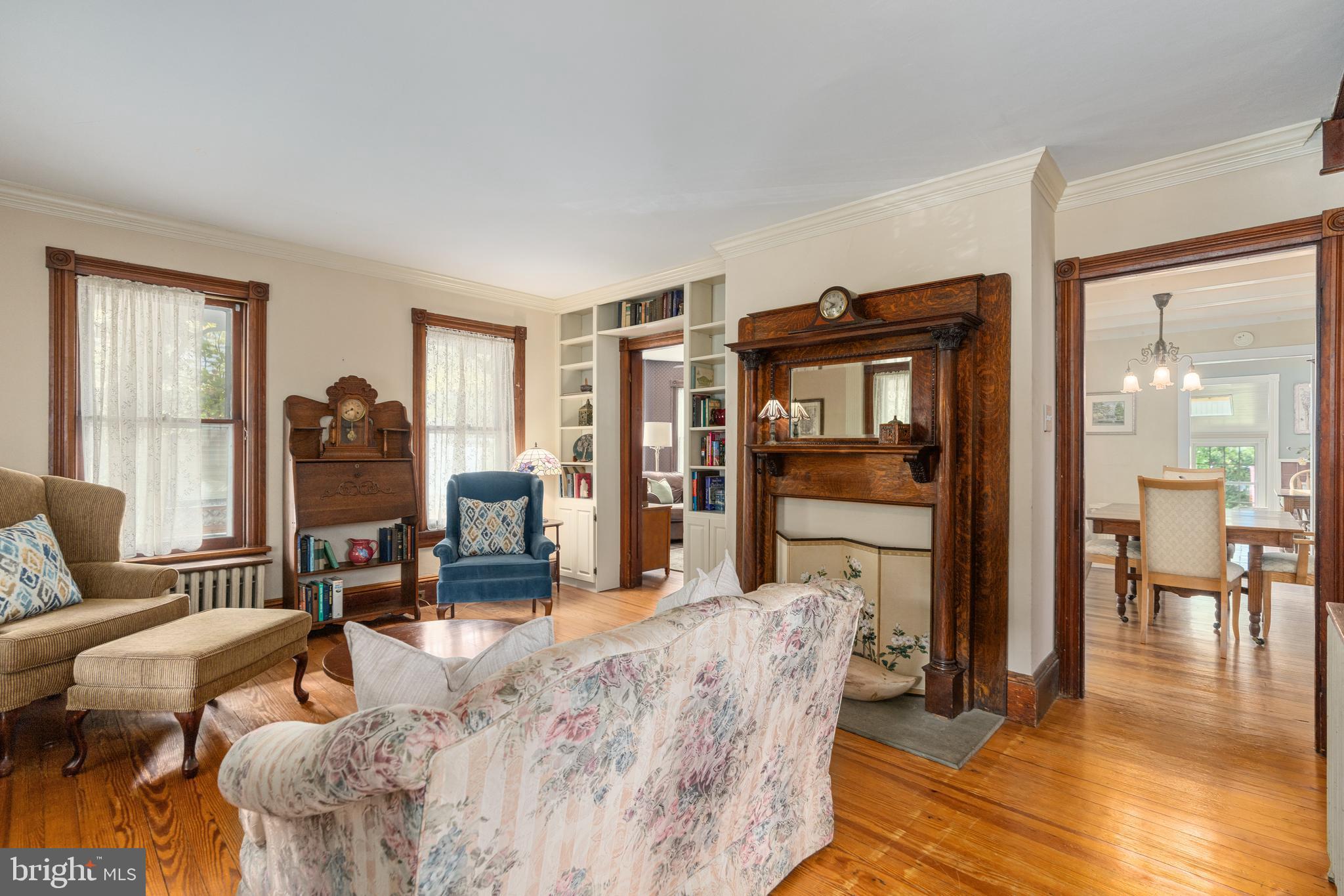 4140 Township Line Road Newtown, PA 18940 - Photo 16 of 41 a living room with furniture and wooden floor