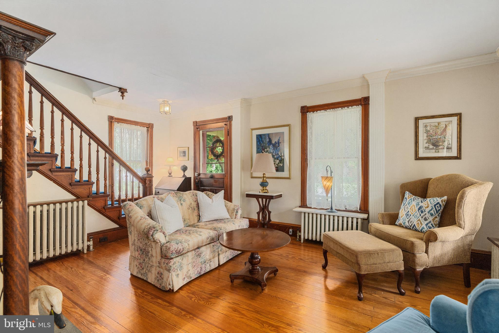 4140 Township Line Road Newtown, PA 18940 - Photo 17 of 41 a living room with furniture and wooden floor