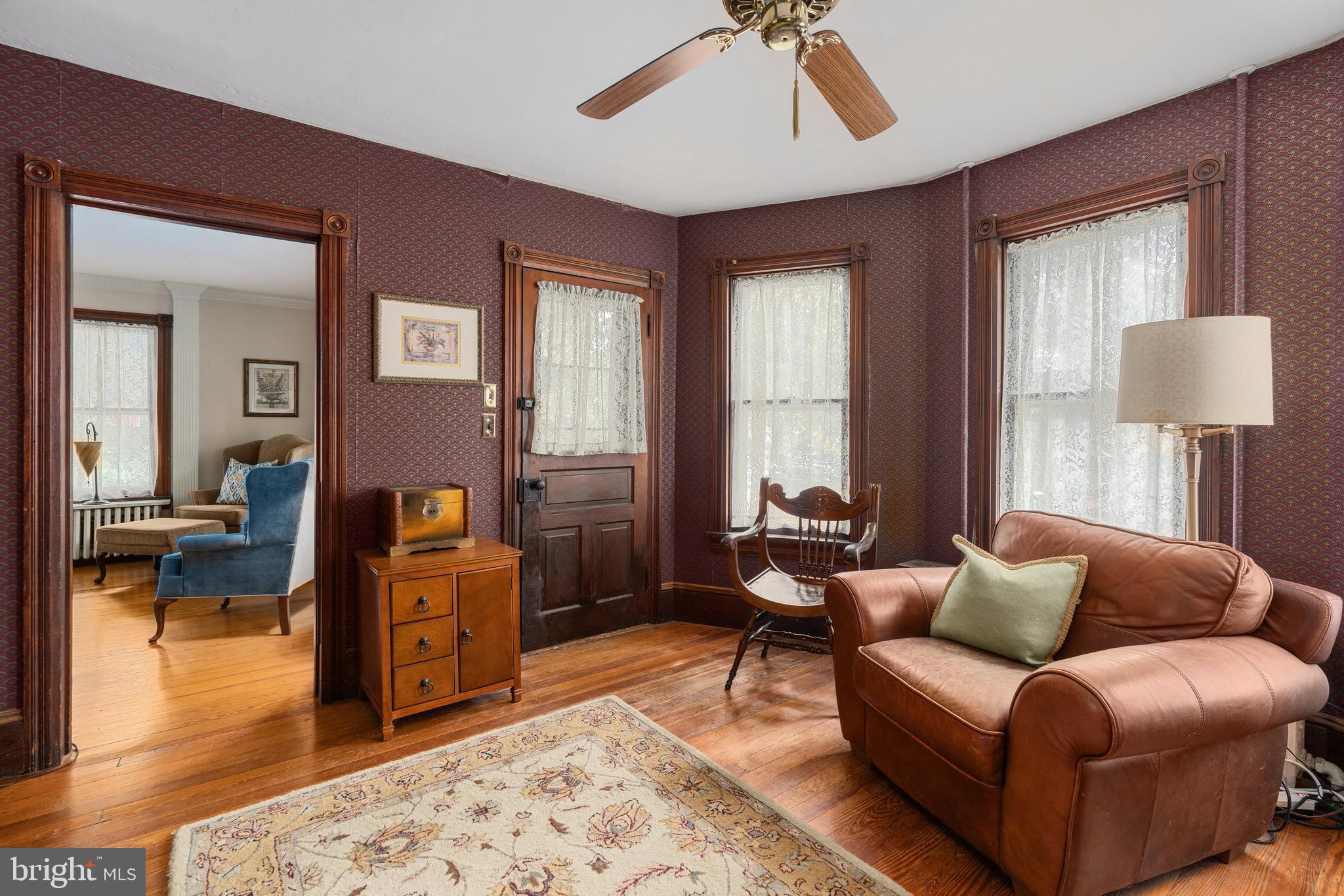 4140 Township Line Road Newtown, PA 18940 - Photo 21 of 41 a living room with furniture and a rug