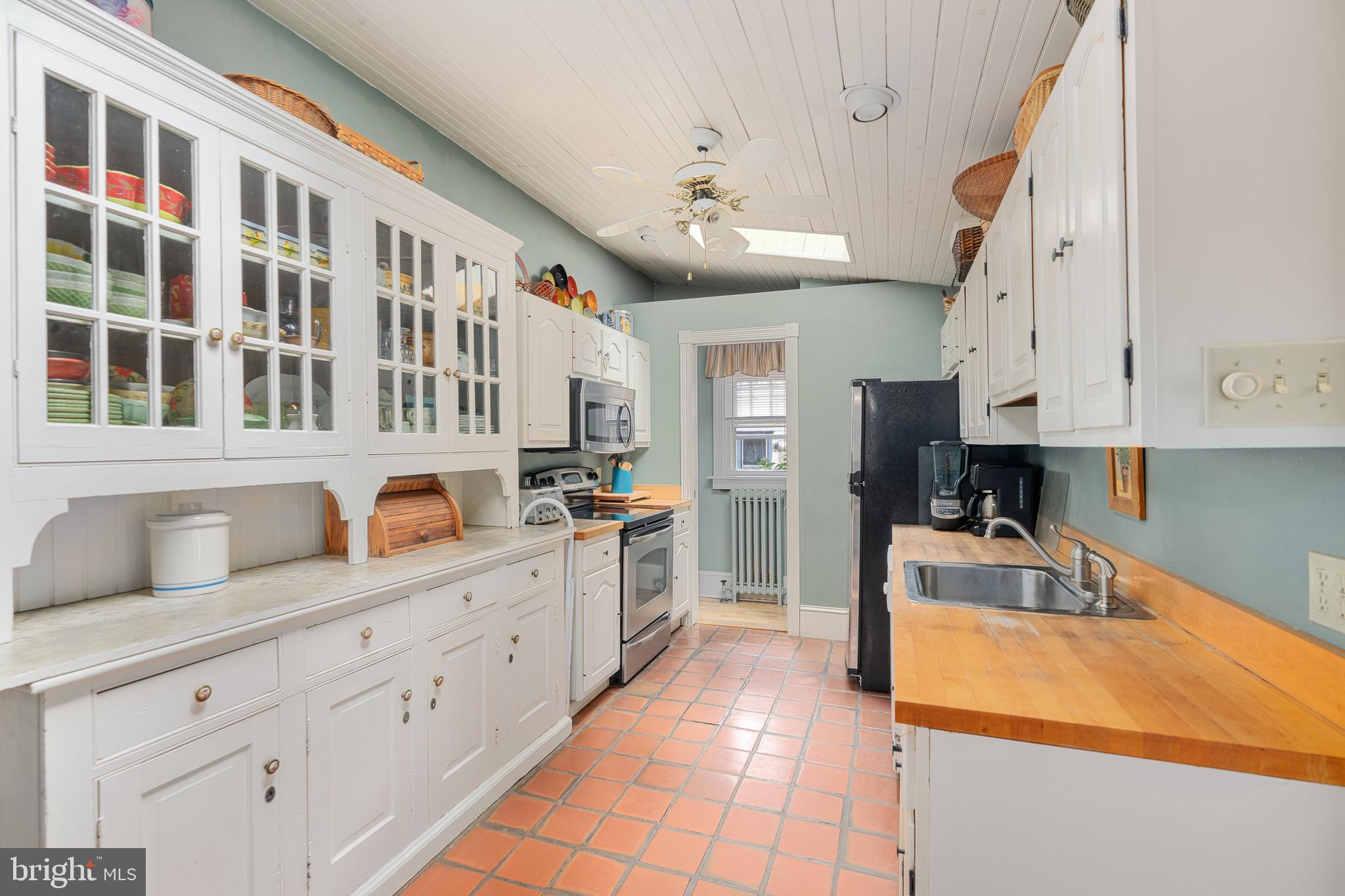 4140 Township Line Road Newtown, PA 18940 - Photo 29 of 41 a kitchen with cabinets and window