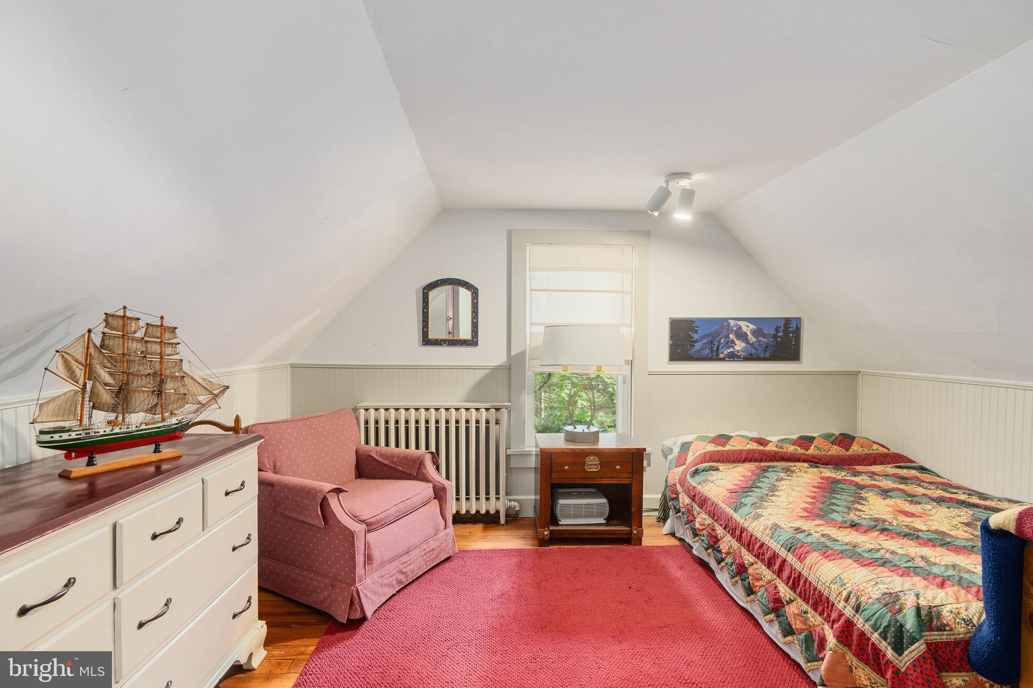 4140 Township Line Road Newtown, PA 18940 - Photo 39 of 41 a bedroom with furniture and a window