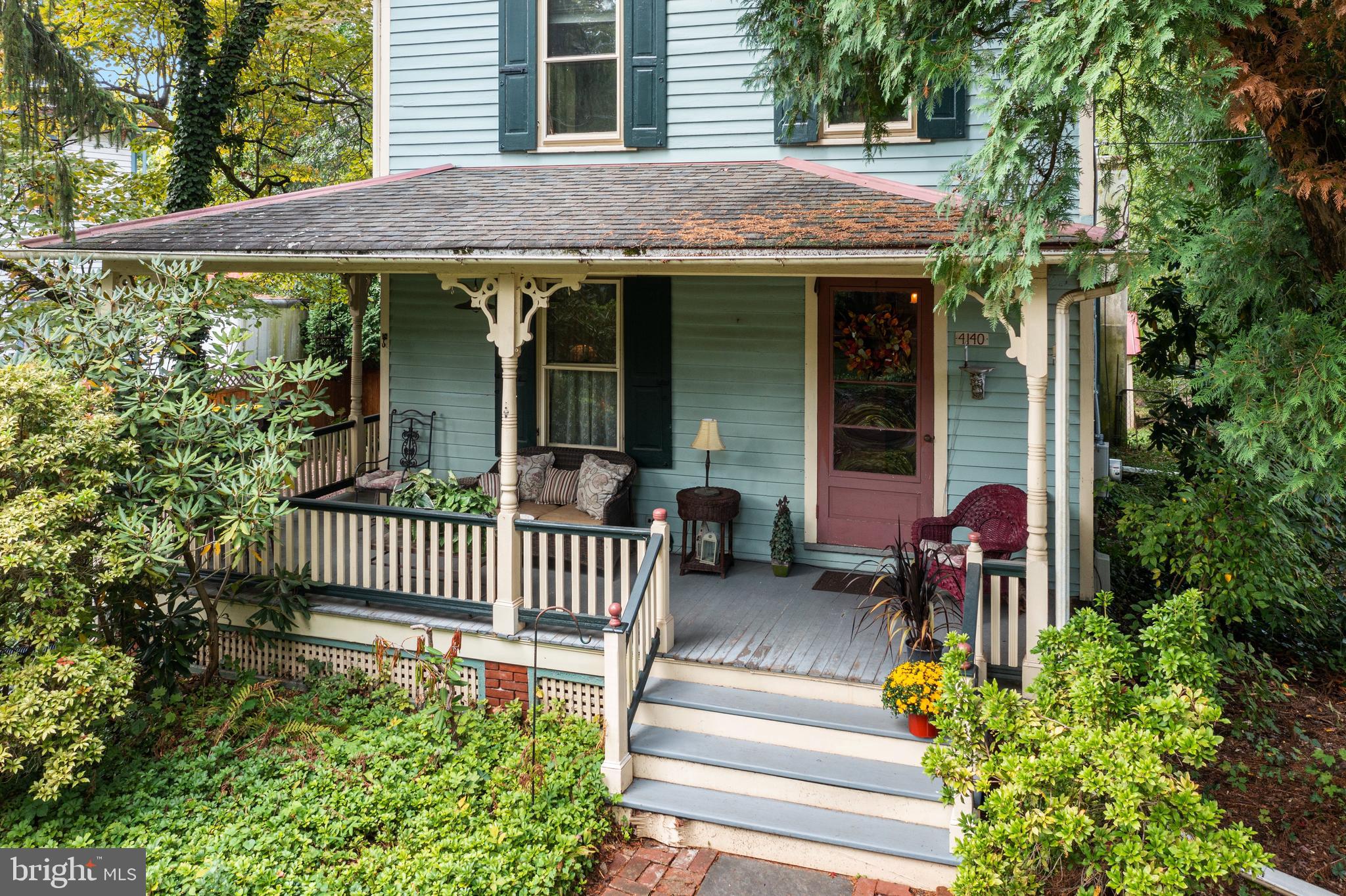 4140 Township Line Road Newtown, PA 18940 - Photo 5 of 41 a front view of a house with garden and porch