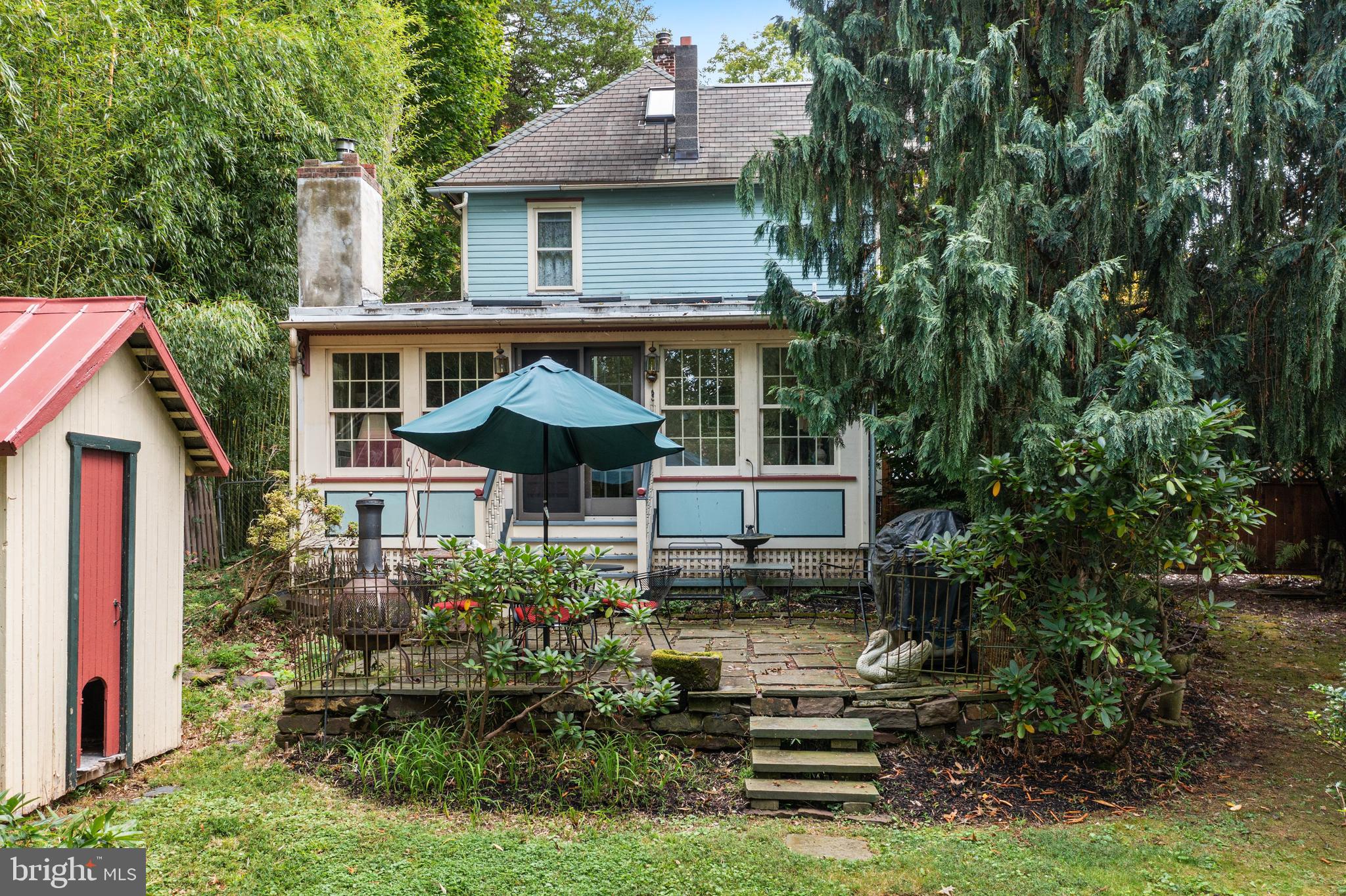 4140 Township Line Road Newtown, PA 18940 - Photo 10 of 41 a view of a house with sitting area and garden