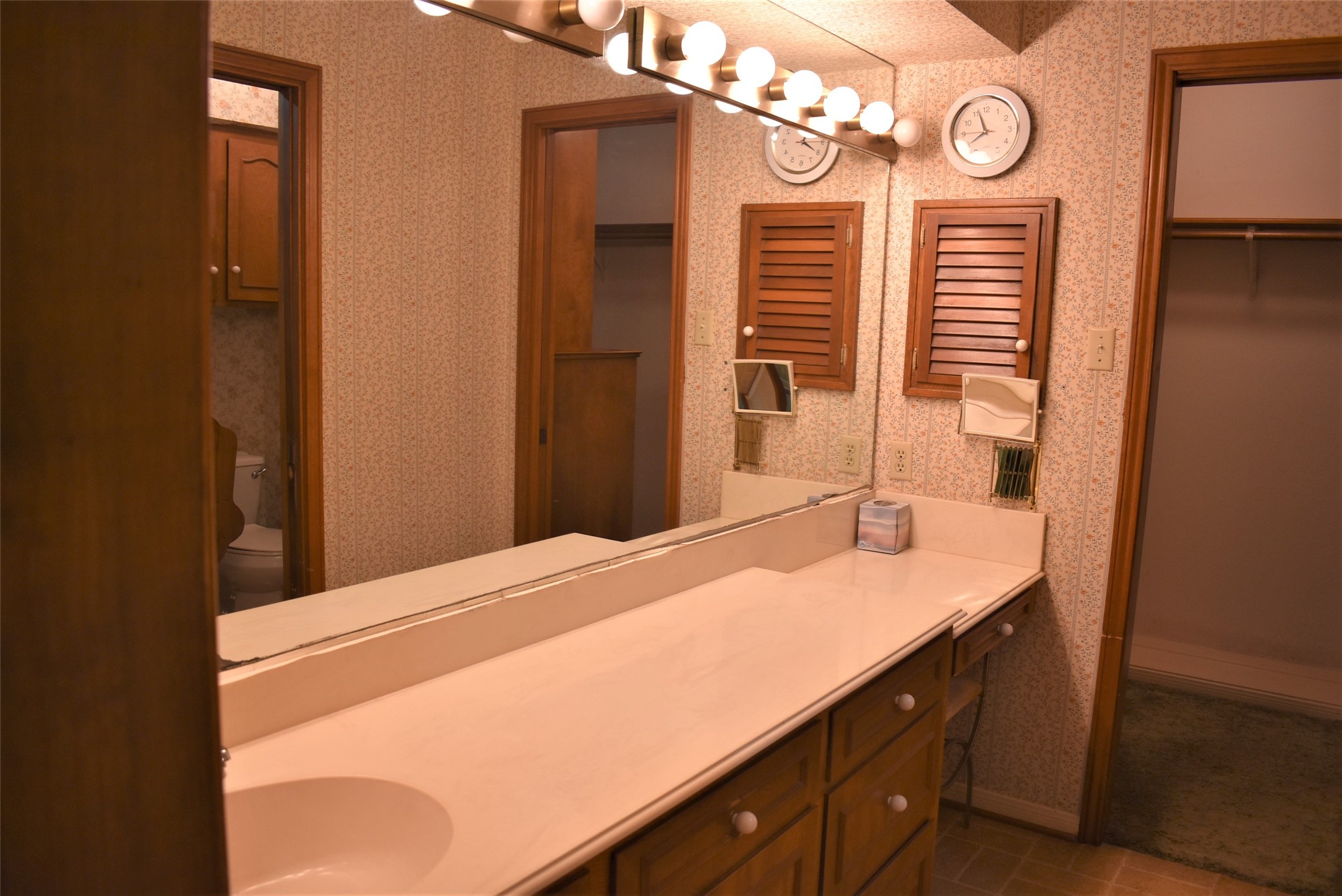 8854 FM 524 Road Sweeny, TX 77480 - Photo 21 of 45 a bathroom with a sink a mirror and a shower