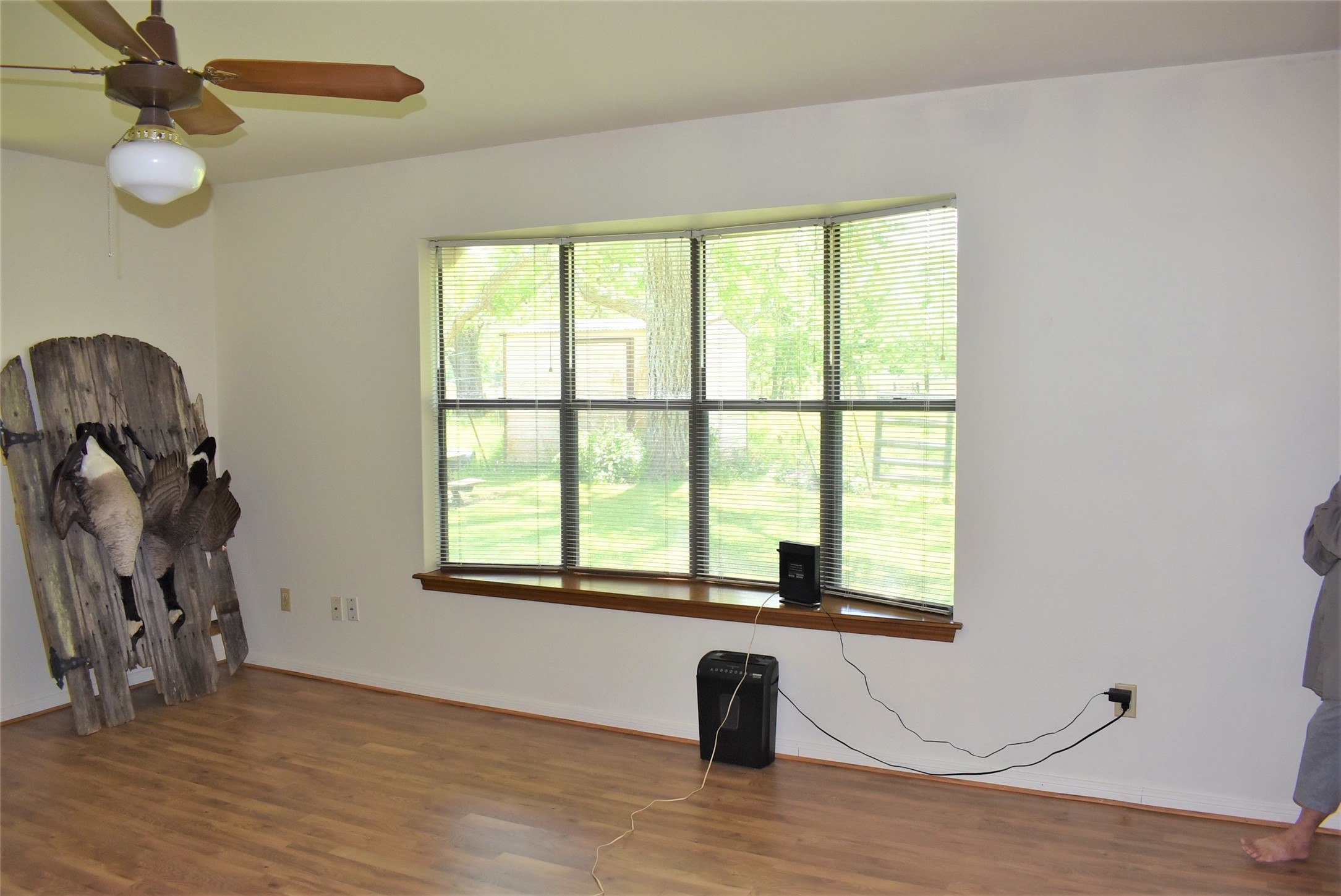 8854 FM 524 Road Sweeny, TX 77480 - Photo 26 of 45 a view of a livingroom with wooden floor and a window