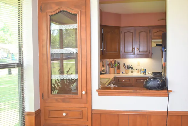 a view of a kitchen and a window