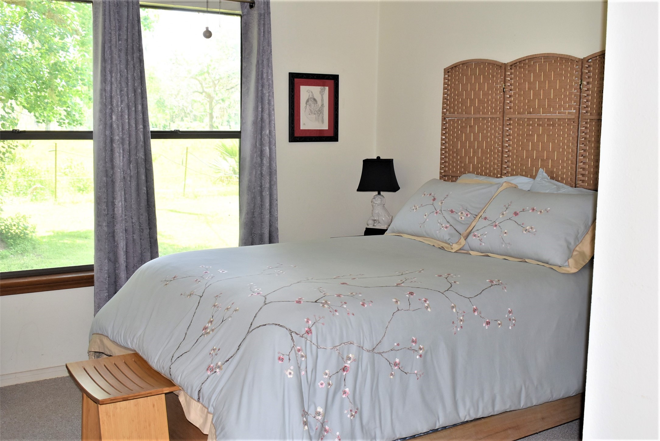 8854 FM 524 Road Sweeny, TX 77480 - Photo 31 of 45 a bedroom with a bed and a window