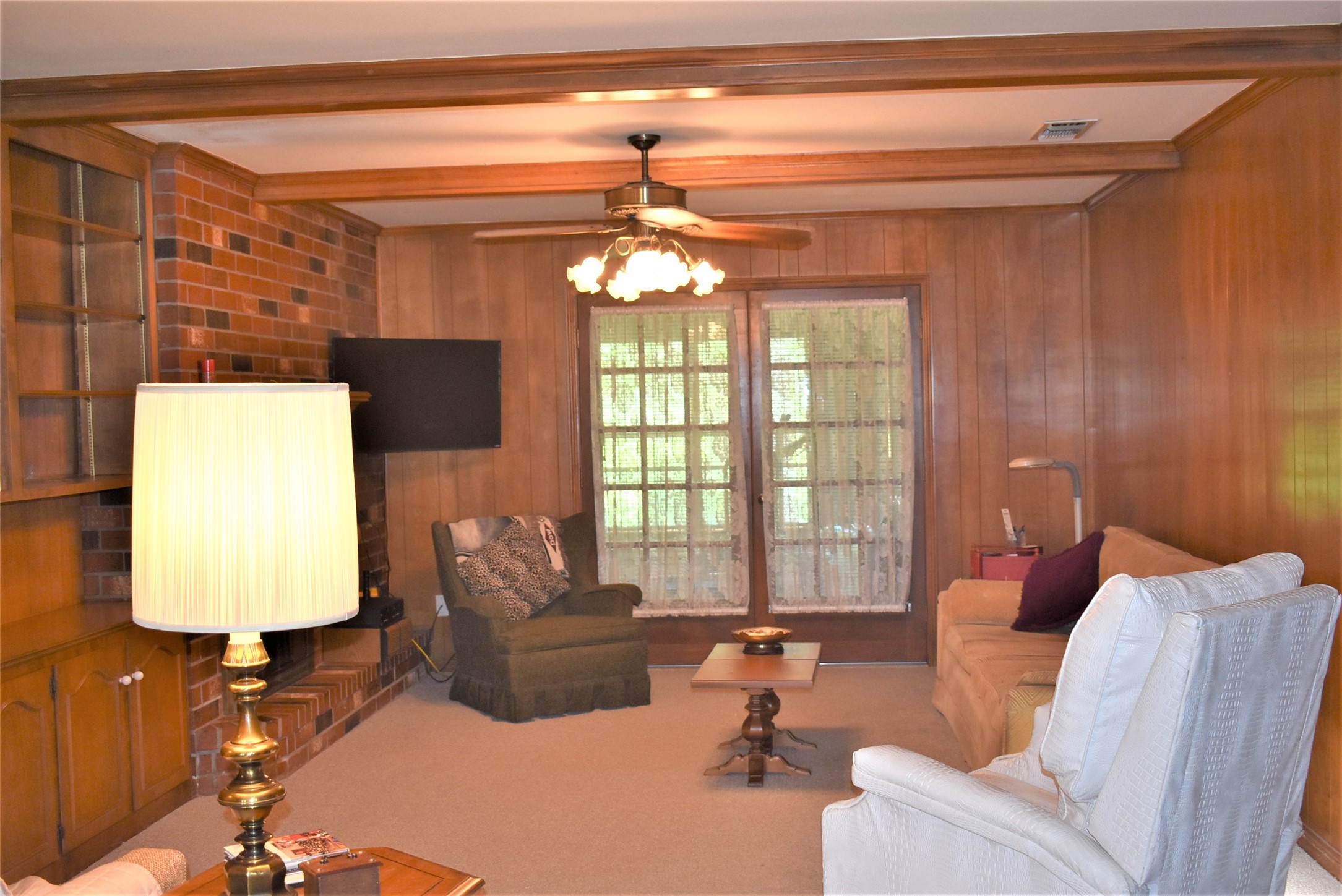 8854 FM 524 Road Sweeny, TX 77480 - Photo 35 of 45 a living room with furniture and a chandelier