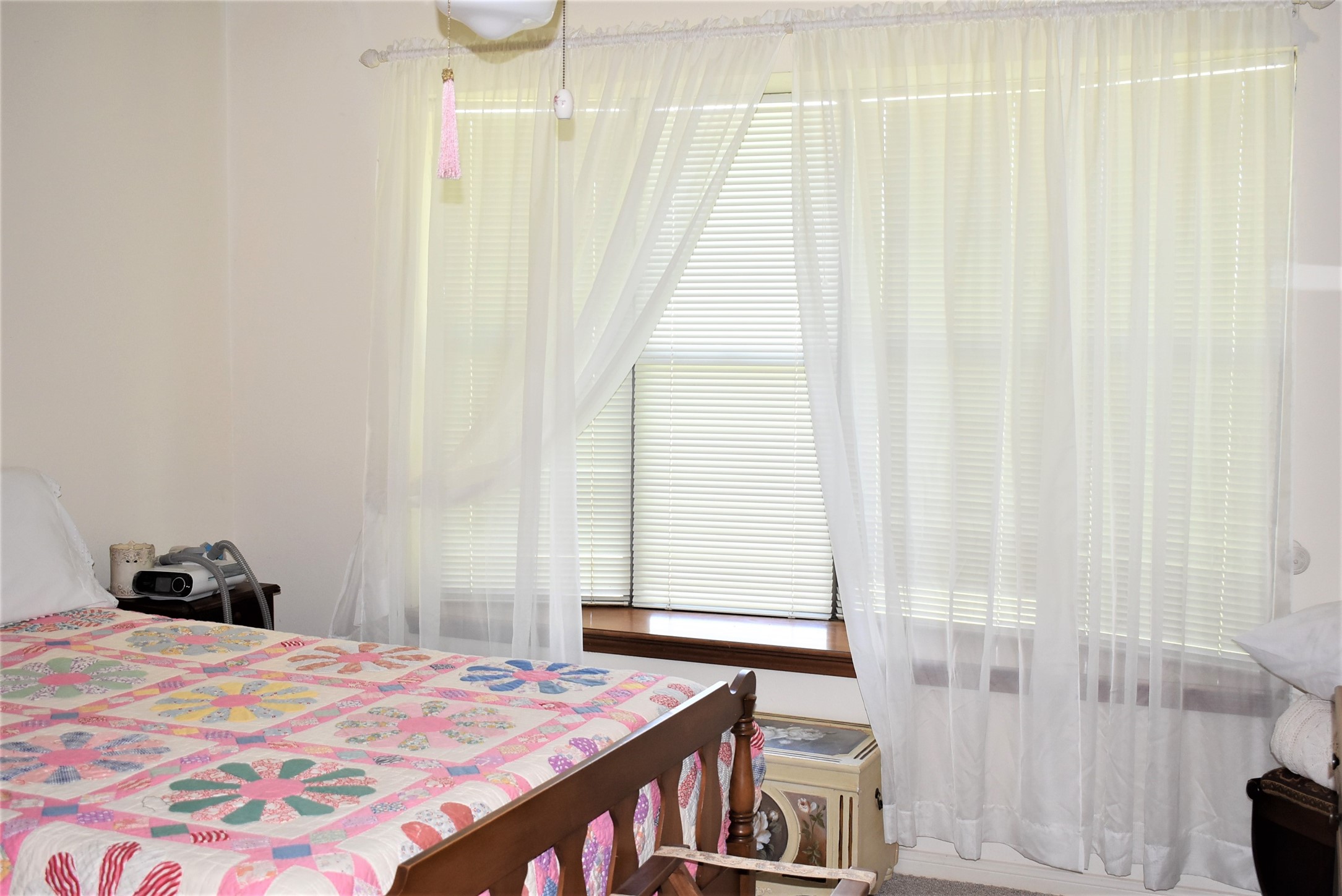 8854 FM 524 Road Sweeny, TX 77480 - Photo 37 of 45 a bedroom with a bed and a window