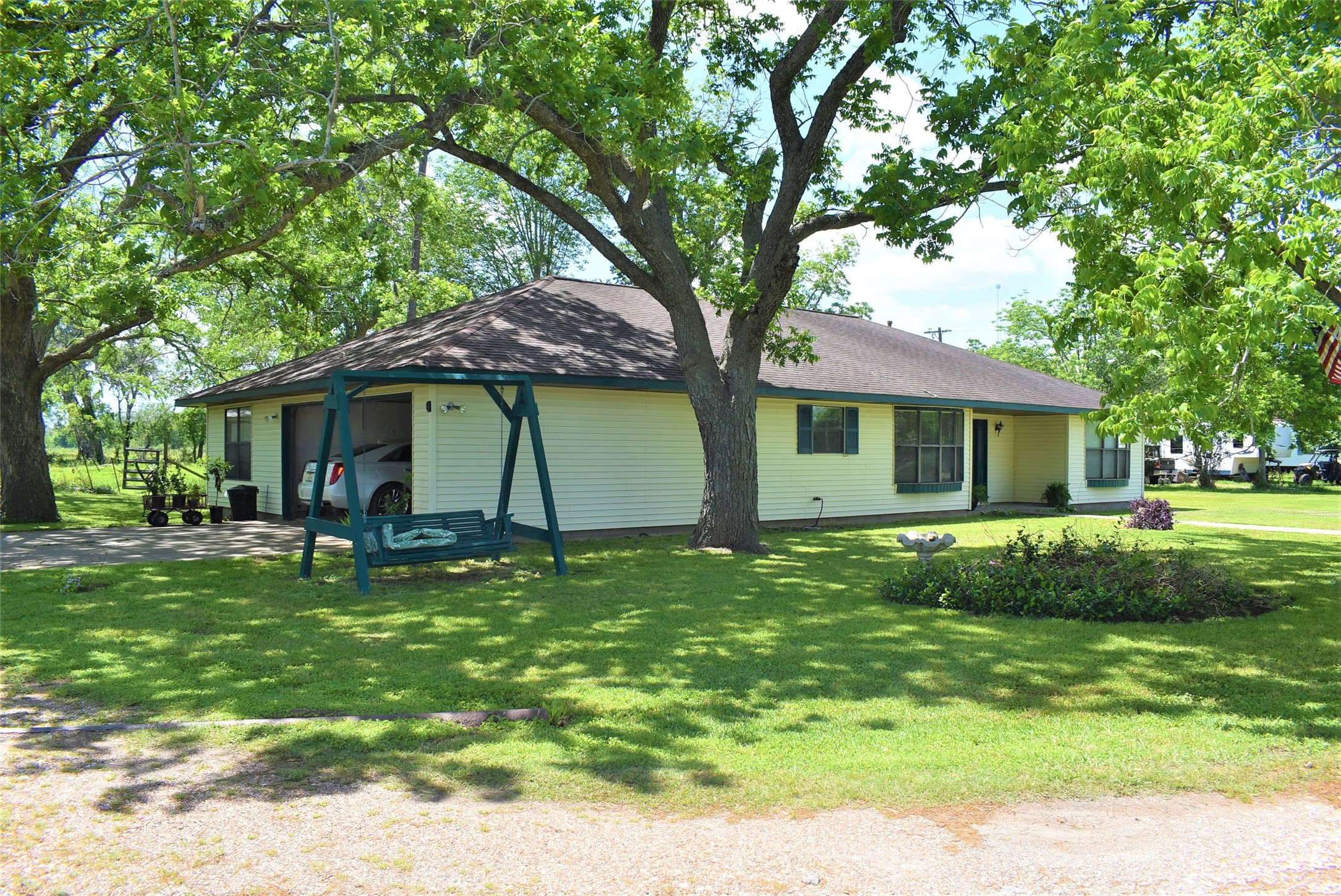 8854 FM 524 Road Sweeny, TX 77480 - Photo 6 of 45 a backyard of a house with seating space