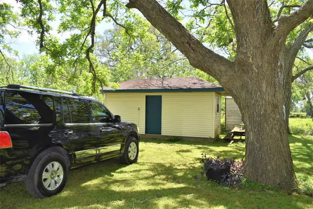 a car parked in front of a house
