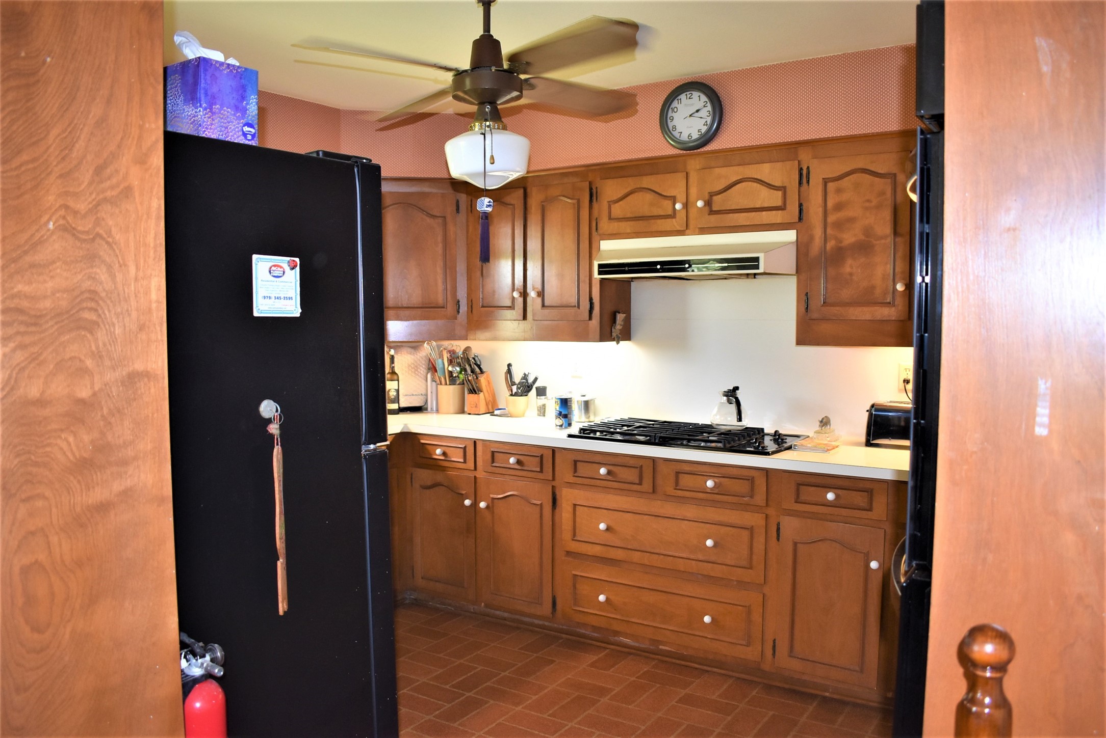 8854 FM 524 Road Sweeny, TX 77480 - Photo 10 of 45 a kitchen with cabinets appliances and furniture
