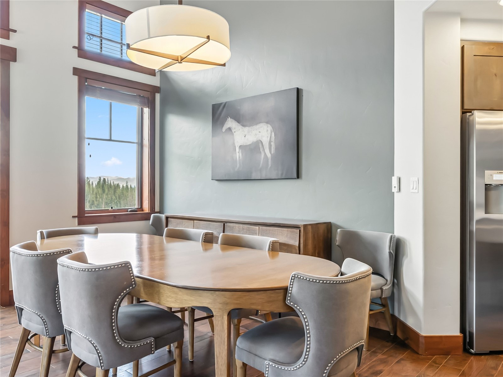 1521 Ski Hill Road, Unit 8424 Breckenridge, CO 80424 - Photo 12 of 41 a dining room with furniture and window
