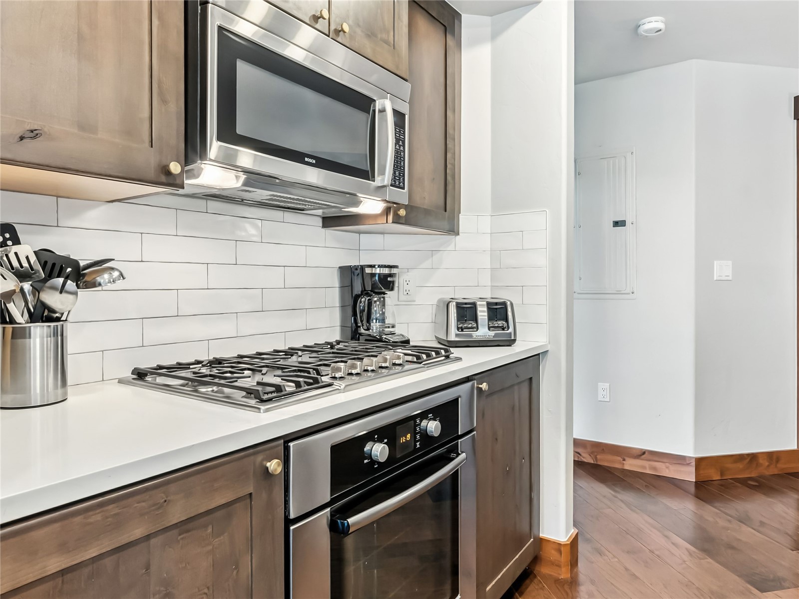 1521 Ski Hill Road, Unit 8424 Breckenridge, CO 80424 - Photo 15 of 41 a kitchen with stainless steel appliances a stove and a microwave