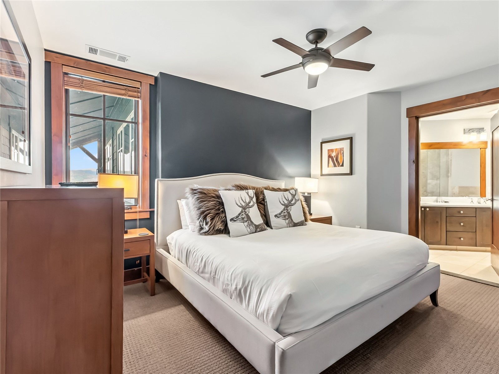 1521 Ski Hill Road, Unit 8424 Breckenridge, CO 80424 - Photo 23 of 41 a bedroom with a bed and window