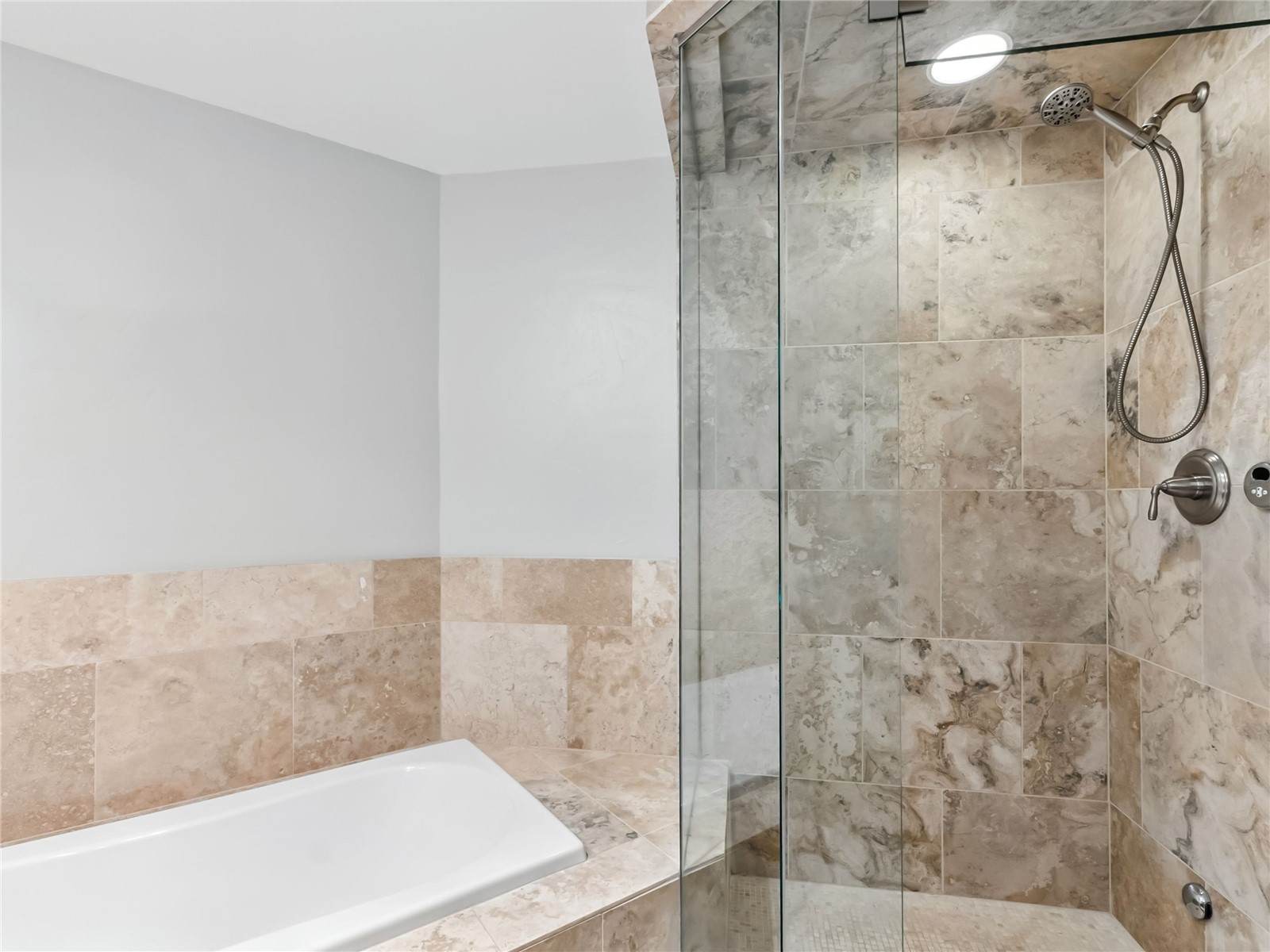 1521 Ski Hill Road, Unit 8424 Breckenridge, CO 80424 - Photo 27 of 41 a bathroom with a bathtub and shower