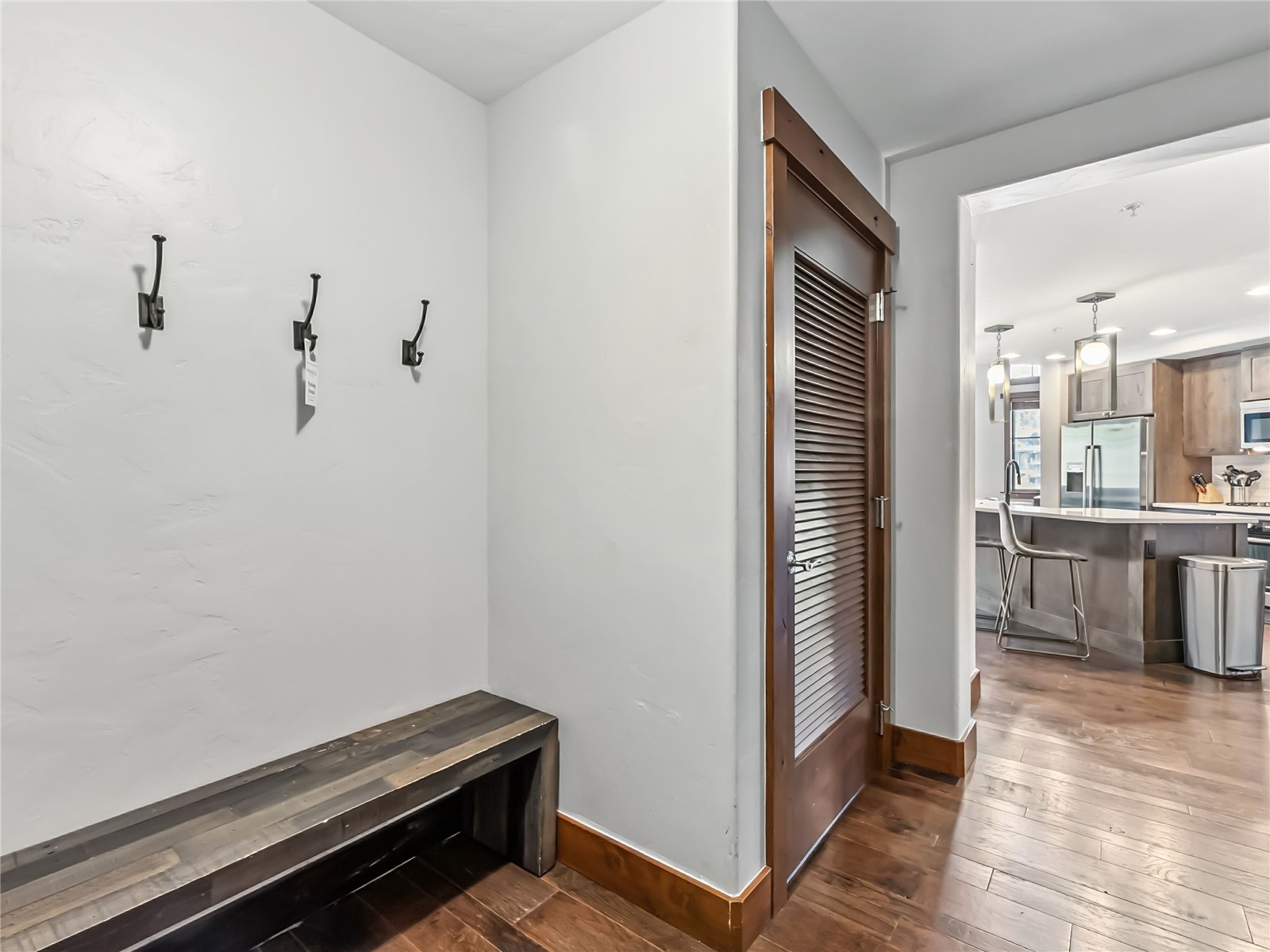 1521 Ski Hill Road, Unit 8424 Breckenridge, CO 80424 - Photo 31 of 41 a view of a hallway with stairs