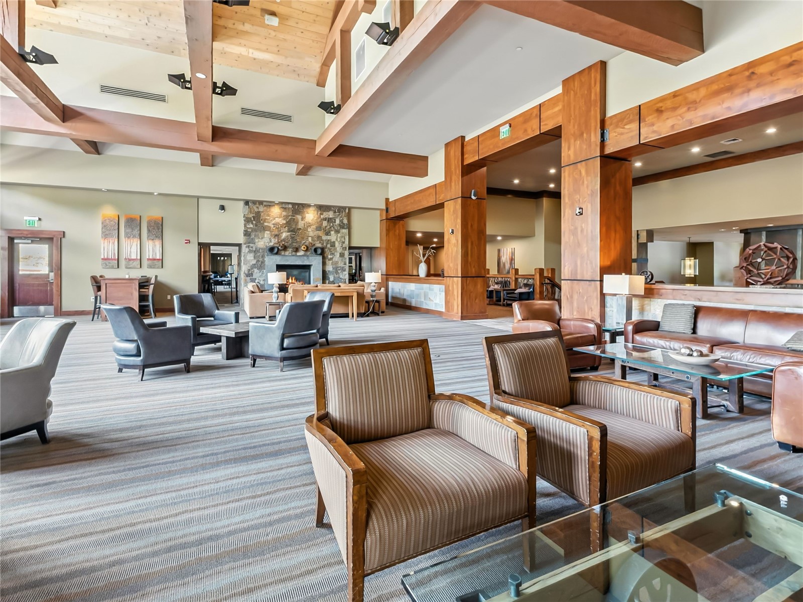 1521 Ski Hill Road, Unit 8424 Breckenridge, CO 80424 - Photo 36 of 41 a living room with furniture and a large window