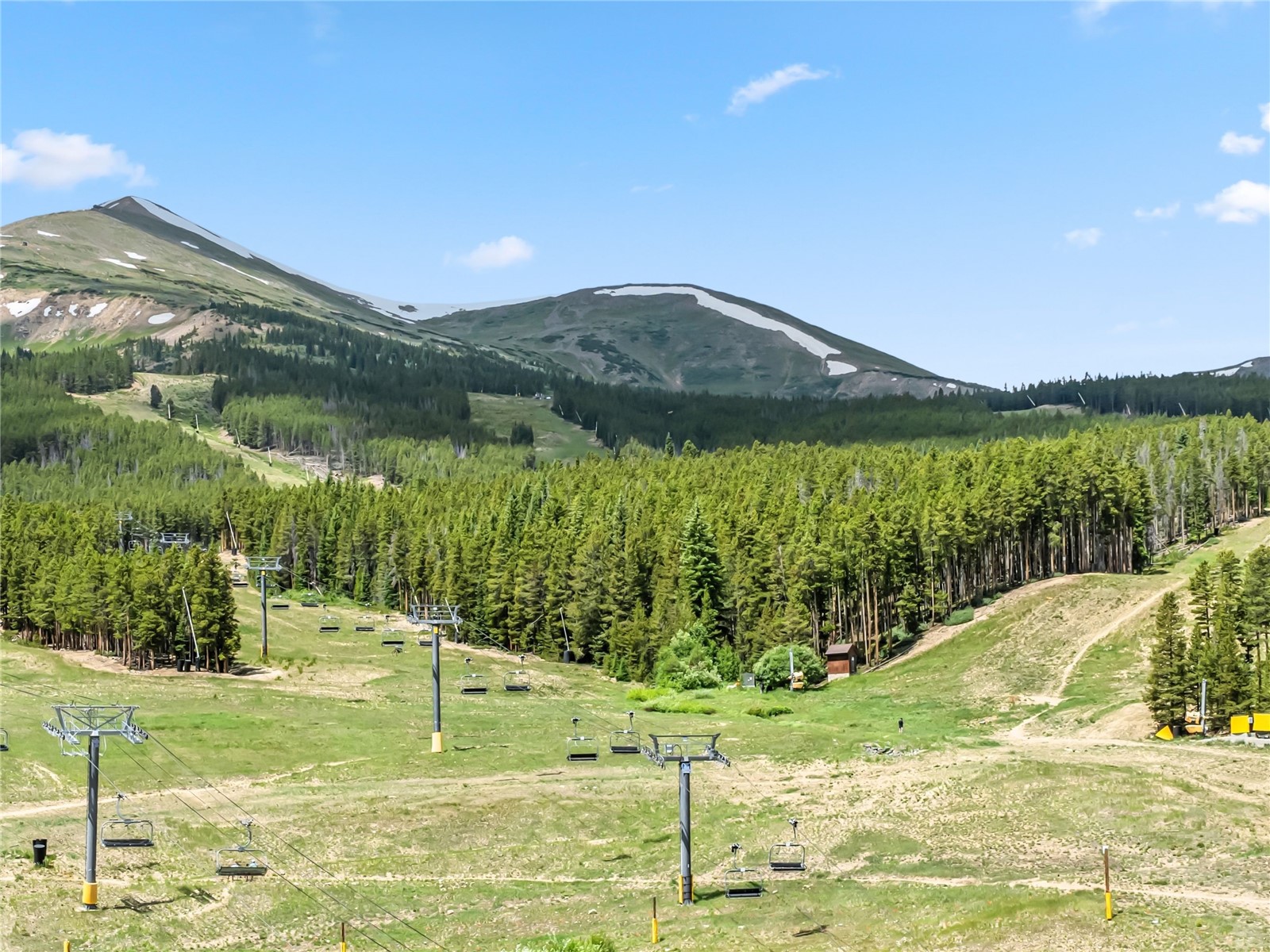 1521 Ski Hill Road, Unit 8424 Breckenridge, CO 80424 - Photo 6 of 41 a view of a lake with a mountain in the background