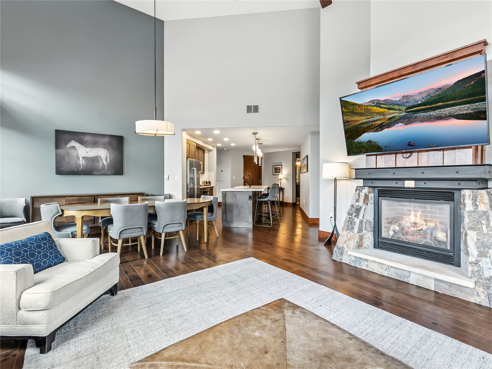 1521 Ski Hill Road, Unit 8424 Breckenridge, CO 80424 - Photo 8 of 41 a living room with furniture and a fireplace