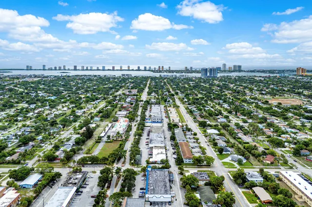 an aerial view of residential building with parking space
