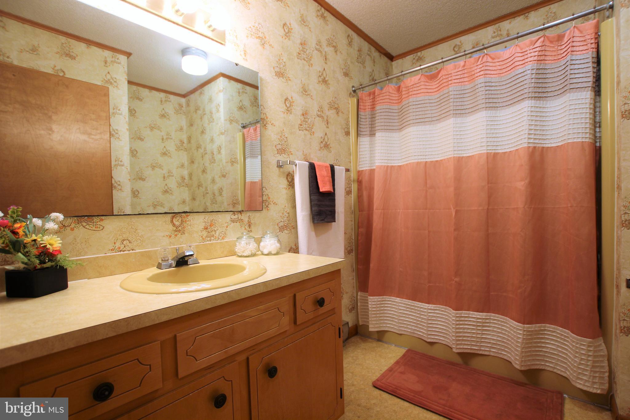 5548 Bonnie Brook Road Cambridge, MD 21613 - Photo 12 of 17 Full Hall Bath