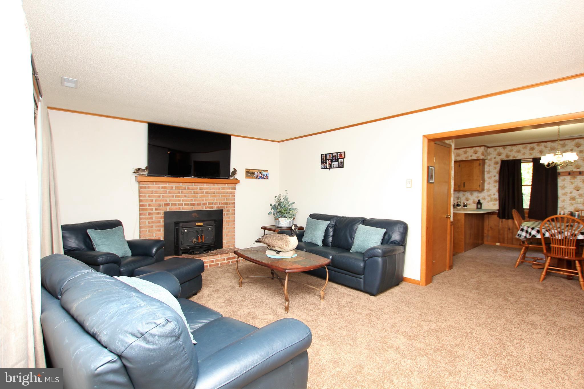5548 Bonnie Brook Road Cambridge, MD 21613 - Photo 3 of 17 Living room into Dining area